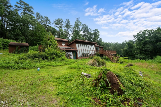 1310 Martin Luther King Pkwy, Durham, NC 27707 - view of yard featuring stairs and a wooden deck