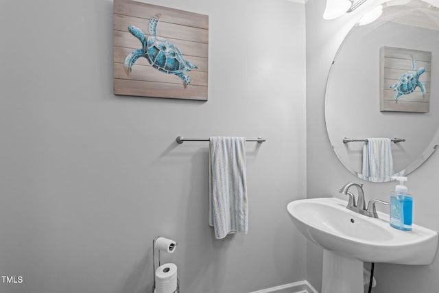 3801 Windsnap Dr, Wake Forest, NC 27587 - bathroom with baseboards and a sink