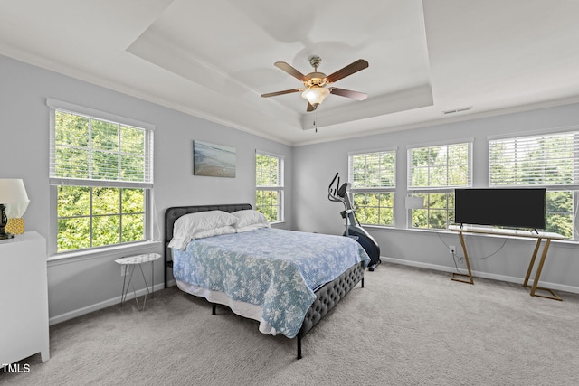 3801 Windsnap Dr, Wake Forest, NC 27587 - carpeted bedroom featuring a raised ceiling, crown molding, and ceiling fan