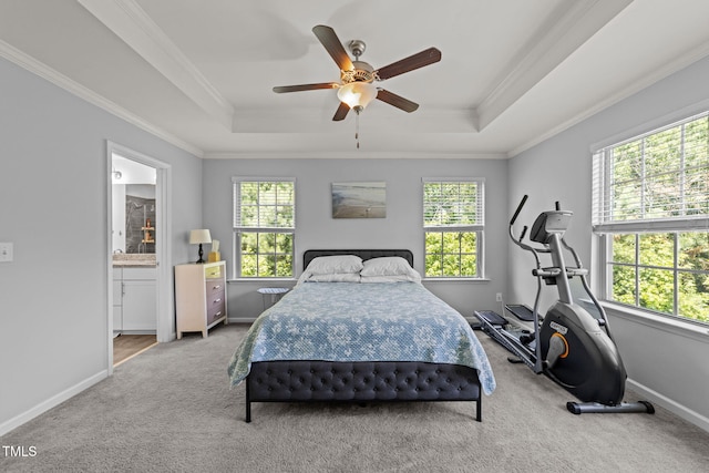 3801 Windsnap Dr, Wake Forest, NC 27587 - carpeted bedroom with a tray ceiling, multiple windows, and ornamental molding