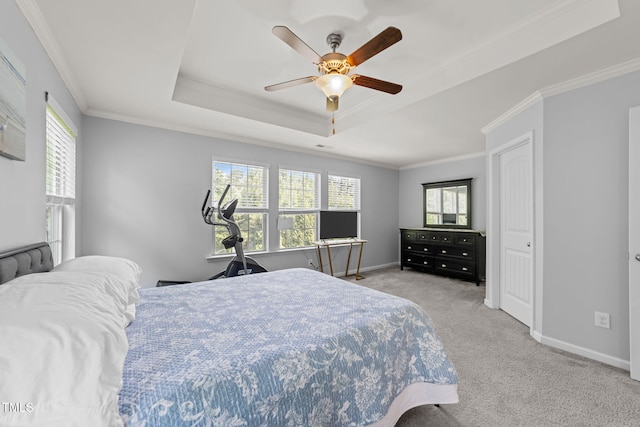 3801 Windsnap Dr, Wake Forest, NC 27587 - bedroom featuring multiple windows, a raised ceiling, ornamental molding, light colored carpet, and ceiling fan