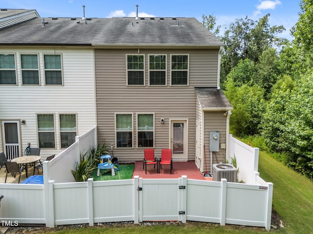 3801 Windsnap Dr, Wake Forest, NC 27587 - back of property featuring a patio area, a gate, a fenced backyard, and roof with shingles