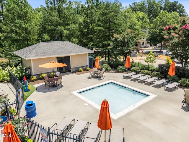 3801 Windsnap Dr, Wake Forest, NC 27587 - community pool with a patio area and an outdoor structure
