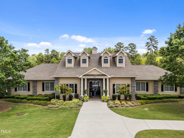 3801 Windsnap Dr, Wake Forest, NC 27587 - cape cod house featuring a front lawn and a shingled roof