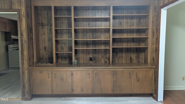 11636 Appaloosa Run W, Raleigh, NC 27613 - detailed view of washer / clothes dryer and wood finished floors