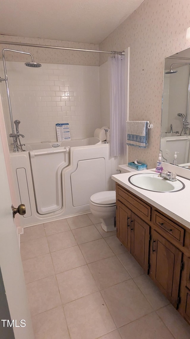 11636 Appaloosa Run W, Raleigh, NC 27613 - bathroom featuring shower / tub combo, vanity, tile patterned flooring, and wallpapered walls