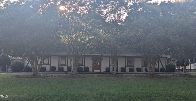 11636 Appaloosa Run W, Raleigh, NC 27613 - rear view of property with a lawn