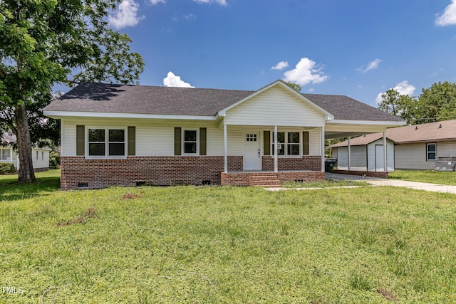 204 Mercer Ct, Goldsboro, NC 27530 - view of front of home with an attached carport, covered porch, crawl space, a front lawn, and brick siding