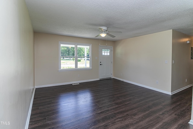 204 Mercer Ct, Goldsboro, NC 27530 - foyer entrance with a ceiling fan, a textured ceiling, and dark wood finished floors