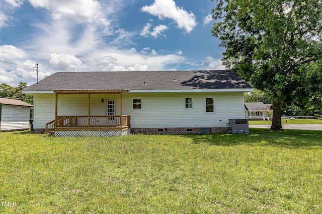 204 Mercer Ct, Goldsboro, NC 27530 - back of property with a lawn, crawl space, a shingled roof, and a deck