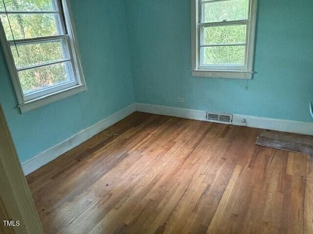 1414 Vickers Ave, Durham, NC 27707 - unfurnished room with wood finished floors