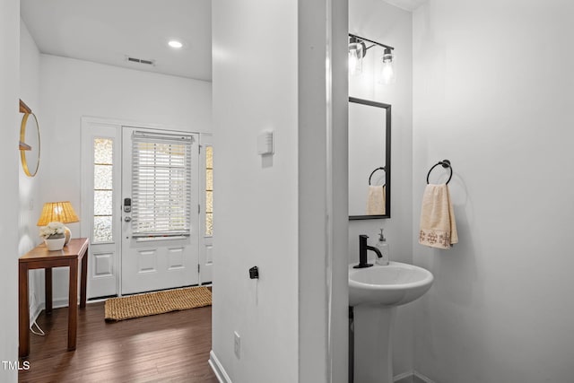 2700 Benevolence Dr, Raleigh, NC 27610 - bathroom with wood finished floors and recessed lighting