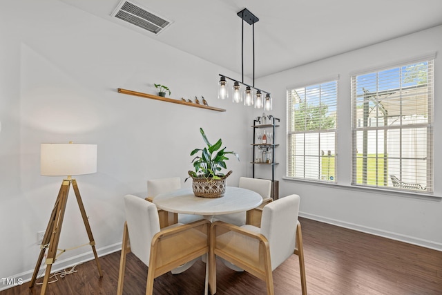 2700 Benevolence Dr, Raleigh, NC 27610 - dining space with baseboards and wood finished floors