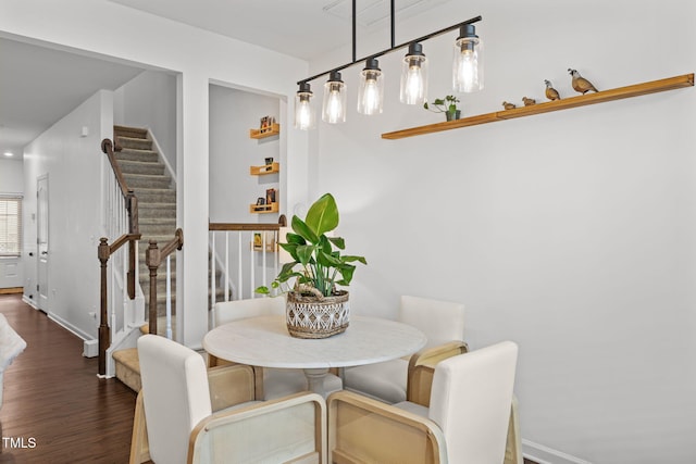 2700 Benevolence Dr, Raleigh, NC 27610 - dining area with stairway and wood finished floors