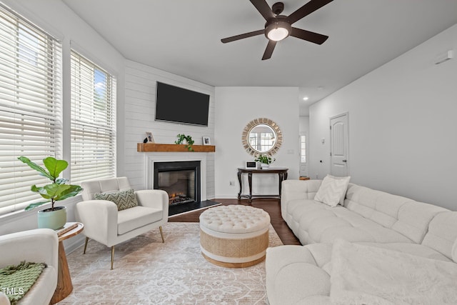 2700 Benevolence Dr, Raleigh, NC 27610 - living room with ceiling fan, healthy amount of natural light, a fireplace, wood finished floors, and recessed lighting
