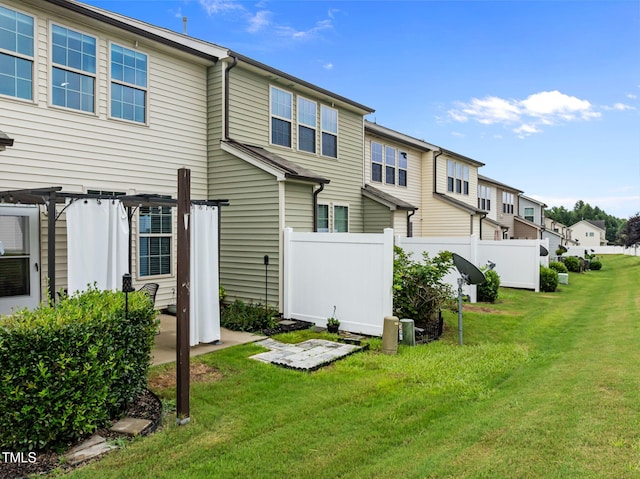 2700 Benevolence Dr, Raleigh, NC 27610 - back of property featuring a pergola, a residential view, and a patio