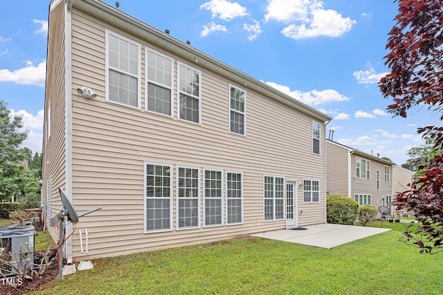 212 Oswego Ct, Morrisville, NC 27560 - rear view of house with a patio and a yard