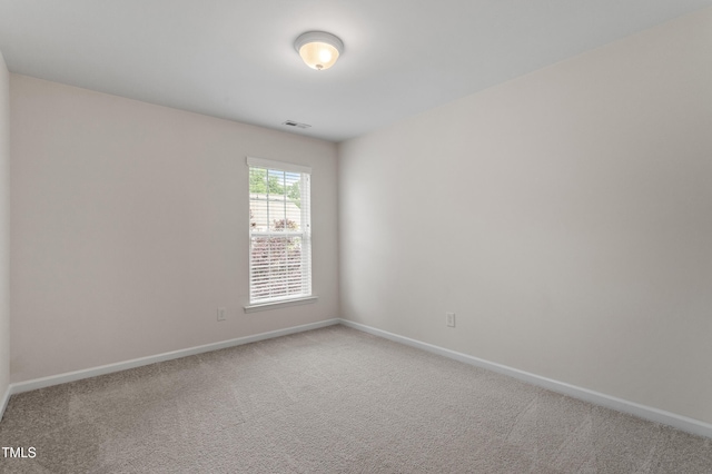 212 Oswego Ct, Morrisville, NC 27560 - carpeted spare room with baseboards