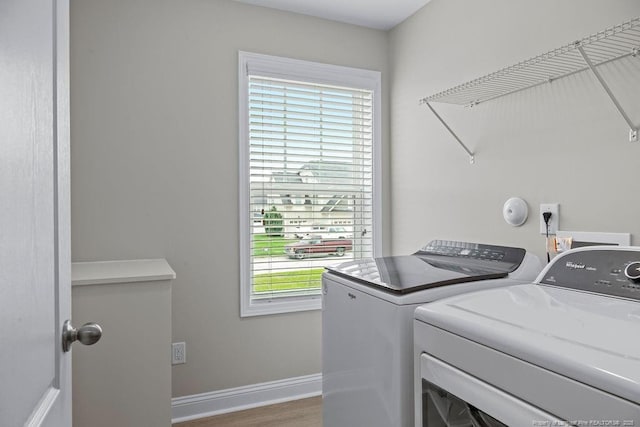 45 Commodore Ct, Cameron, NC 28326 - washroom with washer and dryer, healthy amount of natural light, and wood finished floors