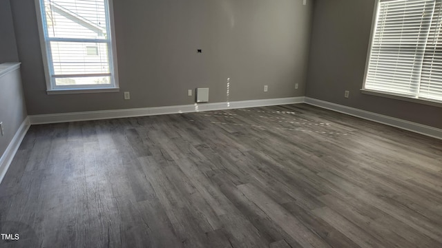 523 Front Ridge Dr, Cary, NC 27519 - empty room featuring dark wood finished floors and baseboards