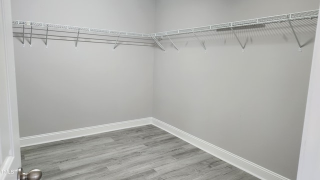 523 Front Ridge Dr, Cary, NC 27519 - spacious closet with wood finished floors