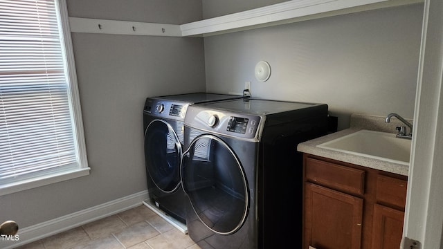 523 Front Ridge Dr, Cary, NC 27519 - laundry room with separate washer and dryer and light tile patterned floors