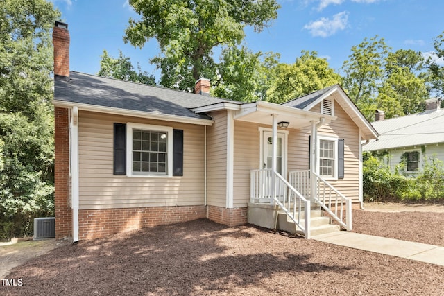 113 Herbert St, Durham, NC 27703 - bungalow-style home with a chimney and a shingled roof