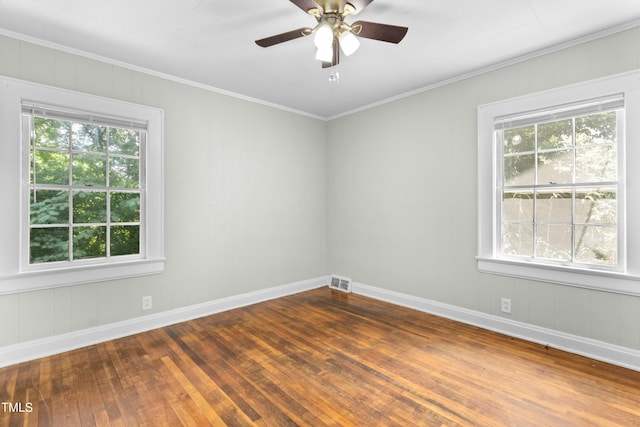 113 Herbert St, Durham, NC 27703 - unfurnished room with ornamental molding, plenty of natural light, hardwood / wood-style floors, and ceiling fan