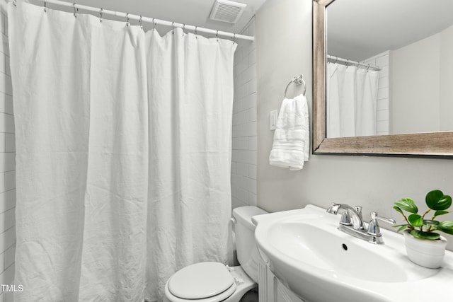 113 Herbert St, Durham, NC 27703 - full bath featuring a shower with curtain and vanity