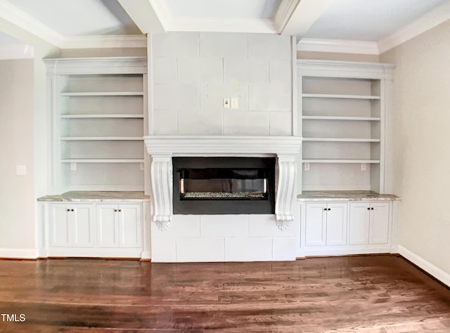 3575 Bragg Valley Ln, Wake Forest, NC 27587 - unfurnished living room with dark wood-type flooring, a glass covered fireplace, and crown molding