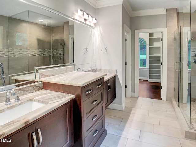 3575 Bragg Valley Ln, Wake Forest, NC 27587 - full bathroom featuring a stall shower, ornamental molding, vanity, and tile patterned flooring