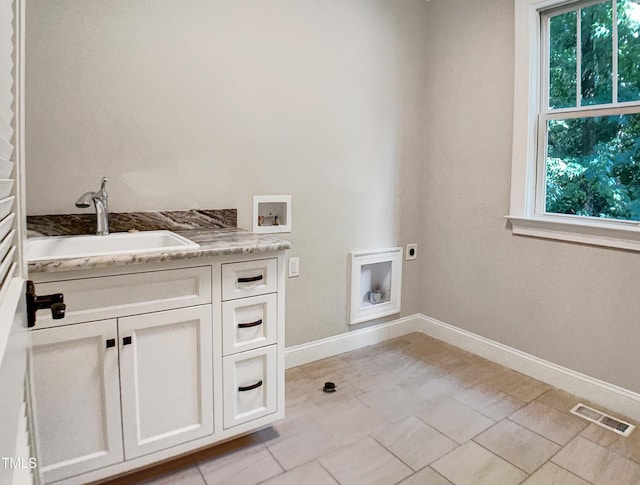 3575 Bragg Valley Ln, Wake Forest, NC 27587 - laundry area featuring electric dryer hookup, washer hookup, and cabinet space