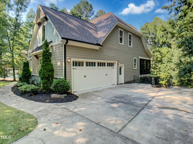 3575 Bragg Valley Ln, Wake Forest, NC 27587 - view of side of property featuring driveway and a shingled roof