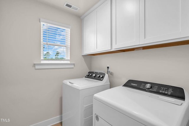 403 Sustainable Way, Raleigh, NC 27610 - laundry room with cabinet space and washing machine and dryer