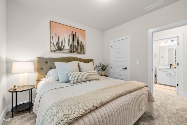 403 Sustainable Way, Raleigh, NC 27610 - bedroom featuring carpet floors and connected bathroom