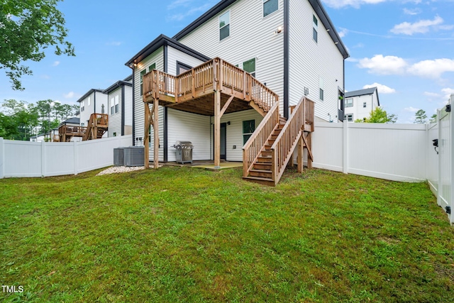 403 Sustainable Way, Raleigh, NC 27610 - rear view of property with a deck, a fenced backyard, and stairs