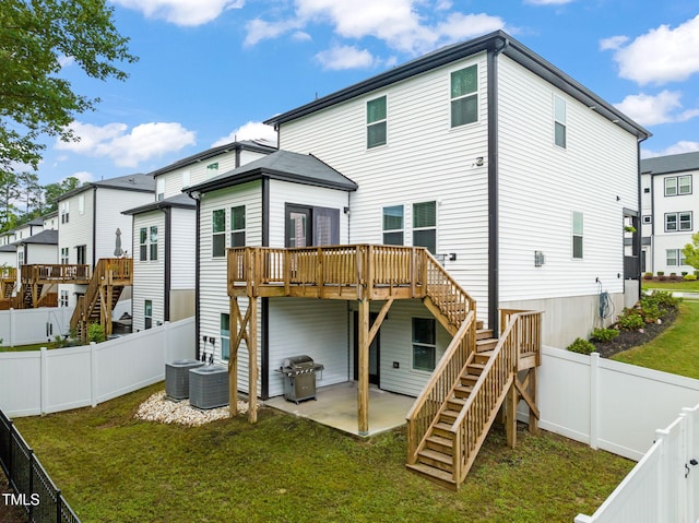 403 Sustainable Way, Raleigh, NC 27610 - back of property featuring stairs, a deck, and a fenced backyard