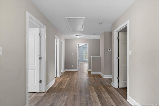4041 Lifestyle Rd, Fayetteville, NC 28312 - hall featuring attic access and wood finished floors