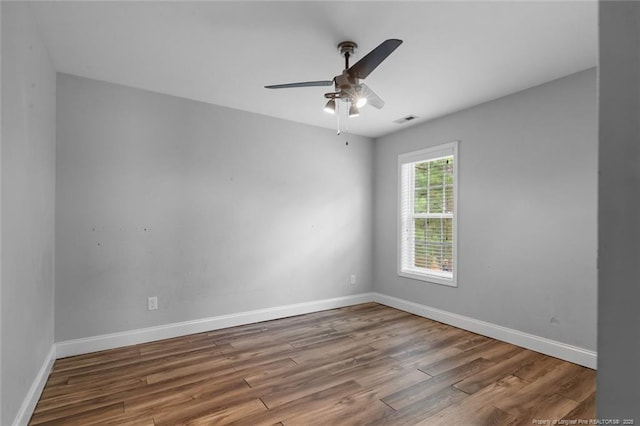 4041 Lifestyle Rd, Fayetteville, NC 28312 - spare room featuring wood finished floors and a ceiling fan