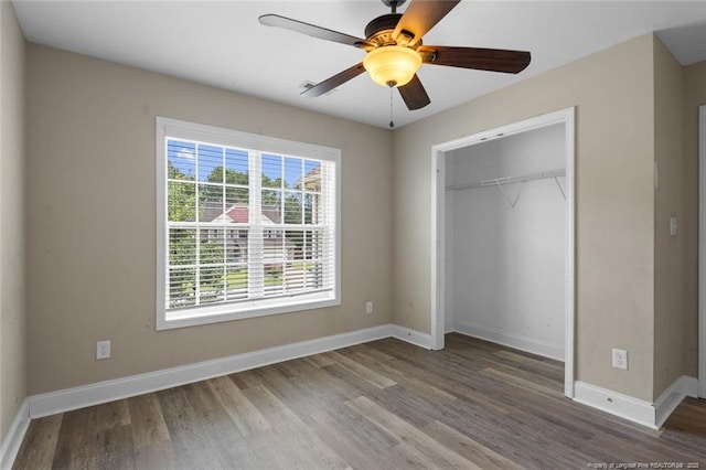 4041 Lifestyle Rd, Fayetteville, NC 28312 - unfurnished bedroom with wood finished floors, a closet, and ceiling fan