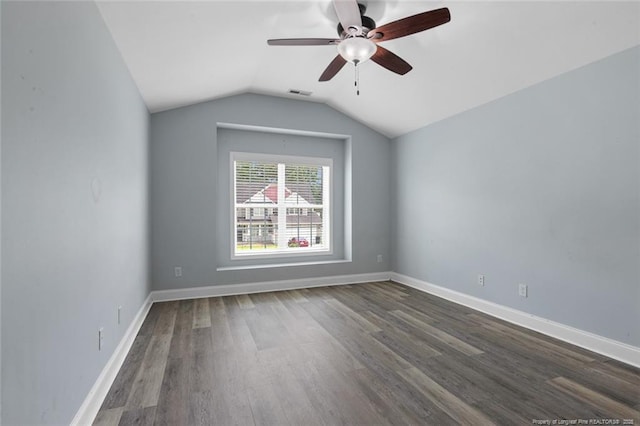 4041 Lifestyle Rd, Fayetteville, NC 28312 - spare room featuring dark wood-type flooring, ceiling fan, and lofted ceiling
