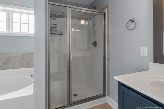 4041 Lifestyle Rd, Fayetteville, NC 28312 - full bathroom with a shower stall, vanity, and a bath