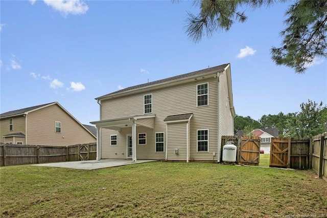 4041 Lifestyle Rd, Fayetteville, NC 28312 - rear view of house with a gate, a patio, and a fenced backyard
