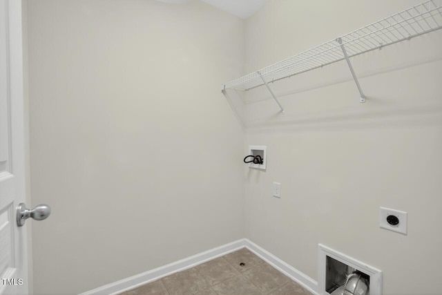 4518 Coral Dr, Durham, NC 27713 - laundry area with hookup for a washing machine, electric dryer hookup, and light tile patterned floors