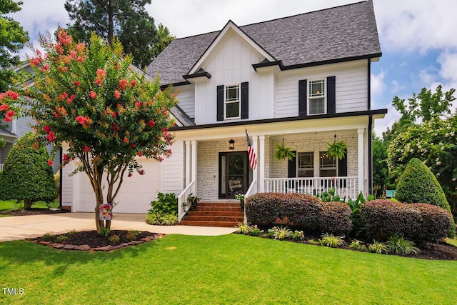 7269 Bedford Ridge Dr, Apex, NC 27539 - view of front of home with driveway, covered porch, a garage, a shingled roof, and a front yard