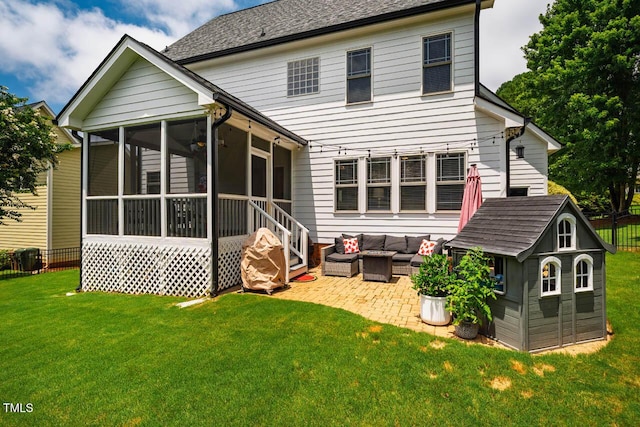 7269 Bedford Ridge Dr, Apex, NC 27539 - rear view of property featuring an outdoor hangout area, a patio area, an outdoor structure, and a sunroom