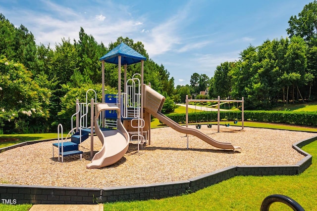 7269 Bedford Ridge Dr, Apex, NC 27539 - community play area featuring view of wooded area and a lawn