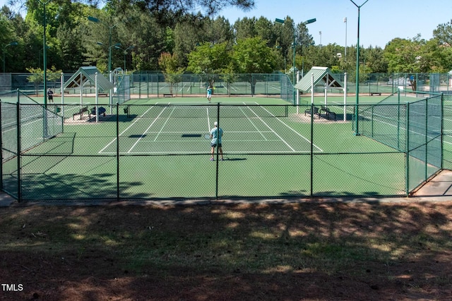 7269 Bedford Ridge Dr, Apex, NC 27539 - view of tennis court with view of scattered trees