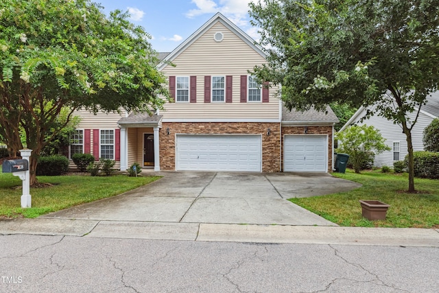 2228 Cedar Grove Dr, Durham, NC 27703 - traditional-style home with driveway, an attached garage, and a front lawn