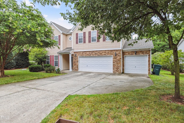 2228 Cedar Grove Dr, Durham, NC 27703 - traditional-style home with driveway, a front yard, an attached garage, and roof with shingles